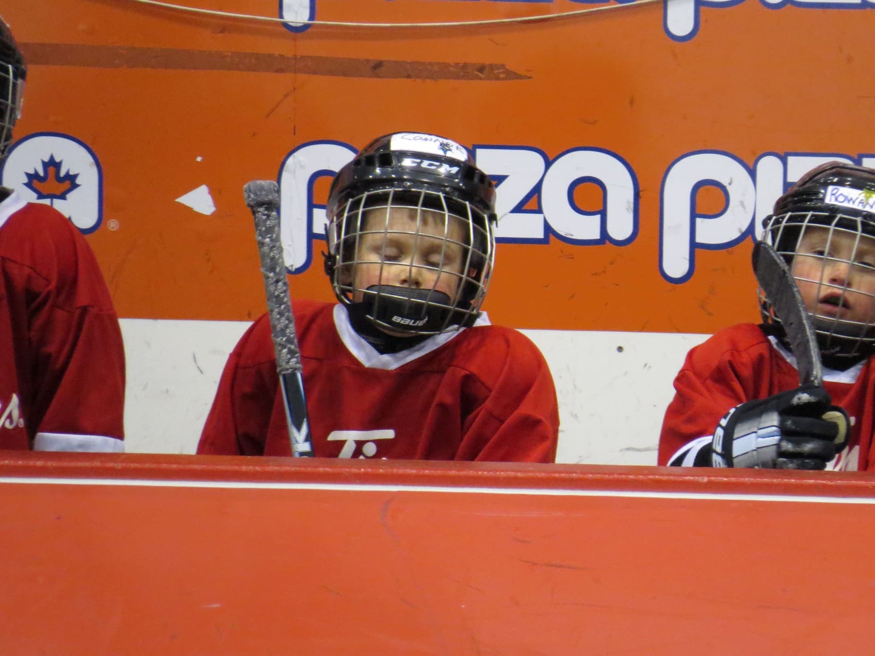 Connor playing hockey as a kid